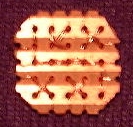 Kreuzstich-Manschettenknopf